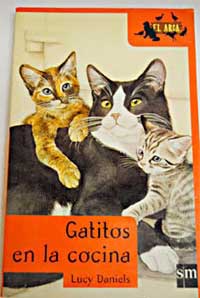 Gatitos en la cocina